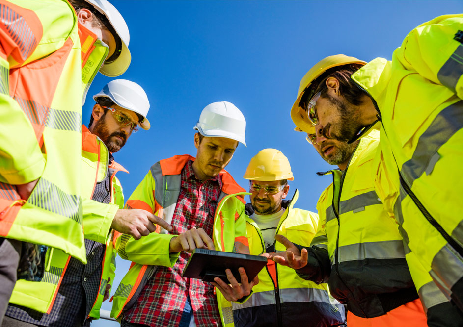 engineers,working,on,water,treatment,plant,with,laptop,and,measuring